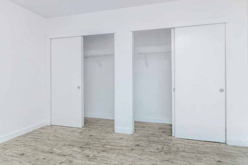Double closets with built-in shelving