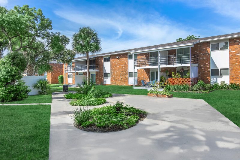 Landscaped courtyard garden with curved walking path